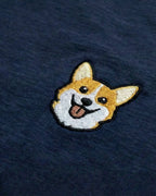 Close-up detail of Corgi embroidery on Navy fabric showing stitch texture.