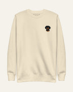 Light Beige Sweatshirt with minimalist embroidered Dachshund icon on left chest.