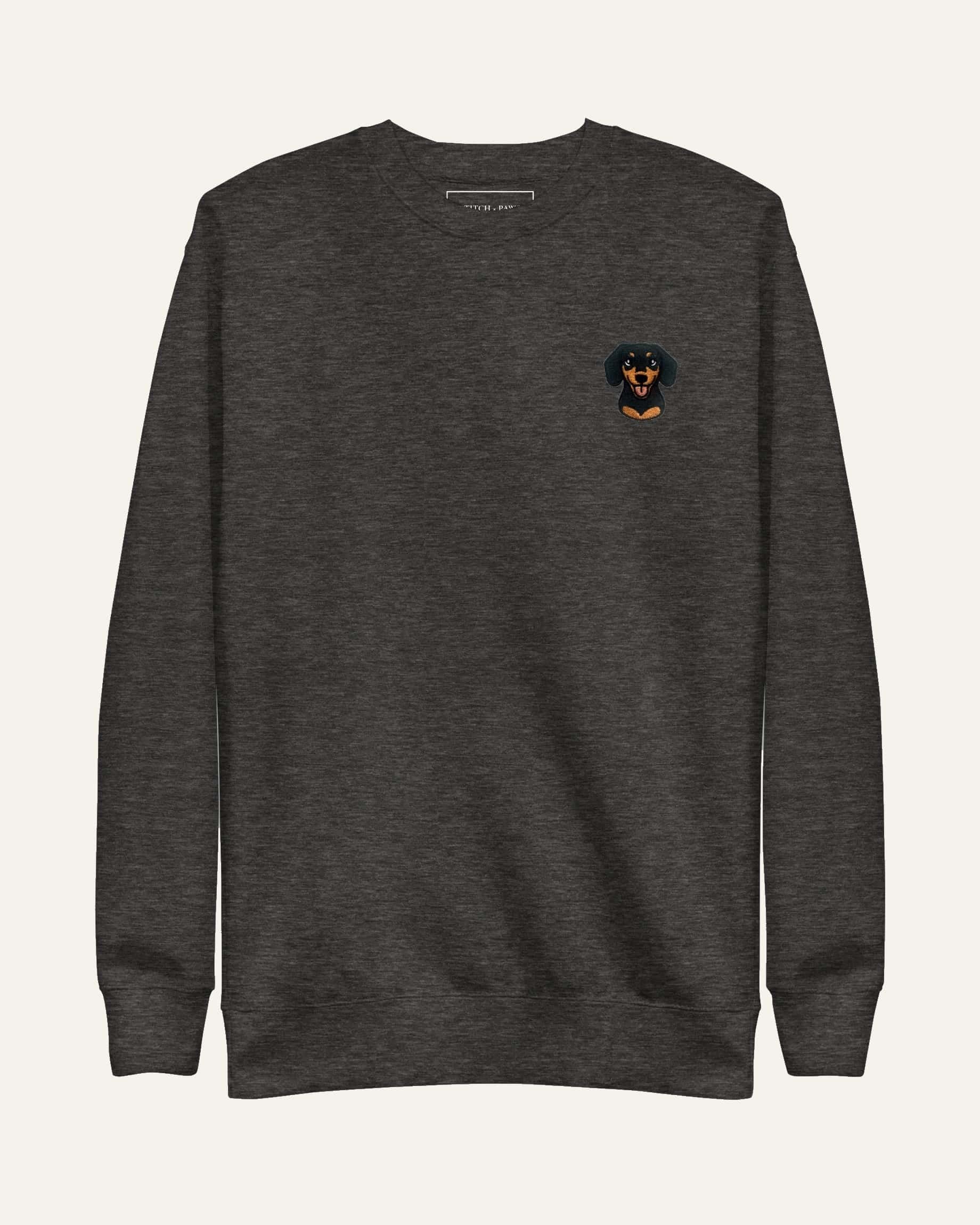 Dark Grey Heather Sweatshirt with minimalist embroidered Dachshund icon on left chest.