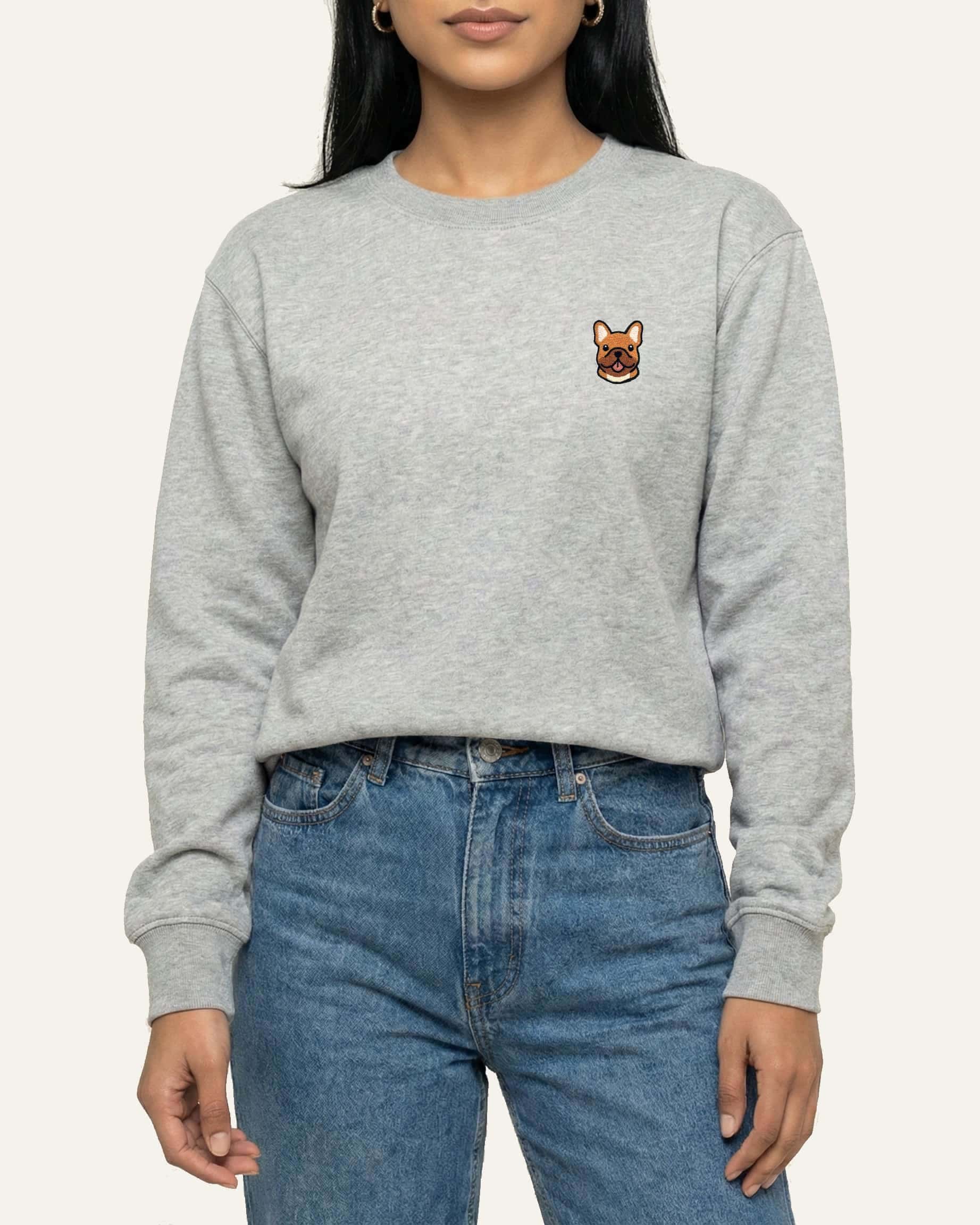 Woman wearing Light Grey Heather Sweatshirt with minimalist embroidered #fawn Frenchie icon on left chest.