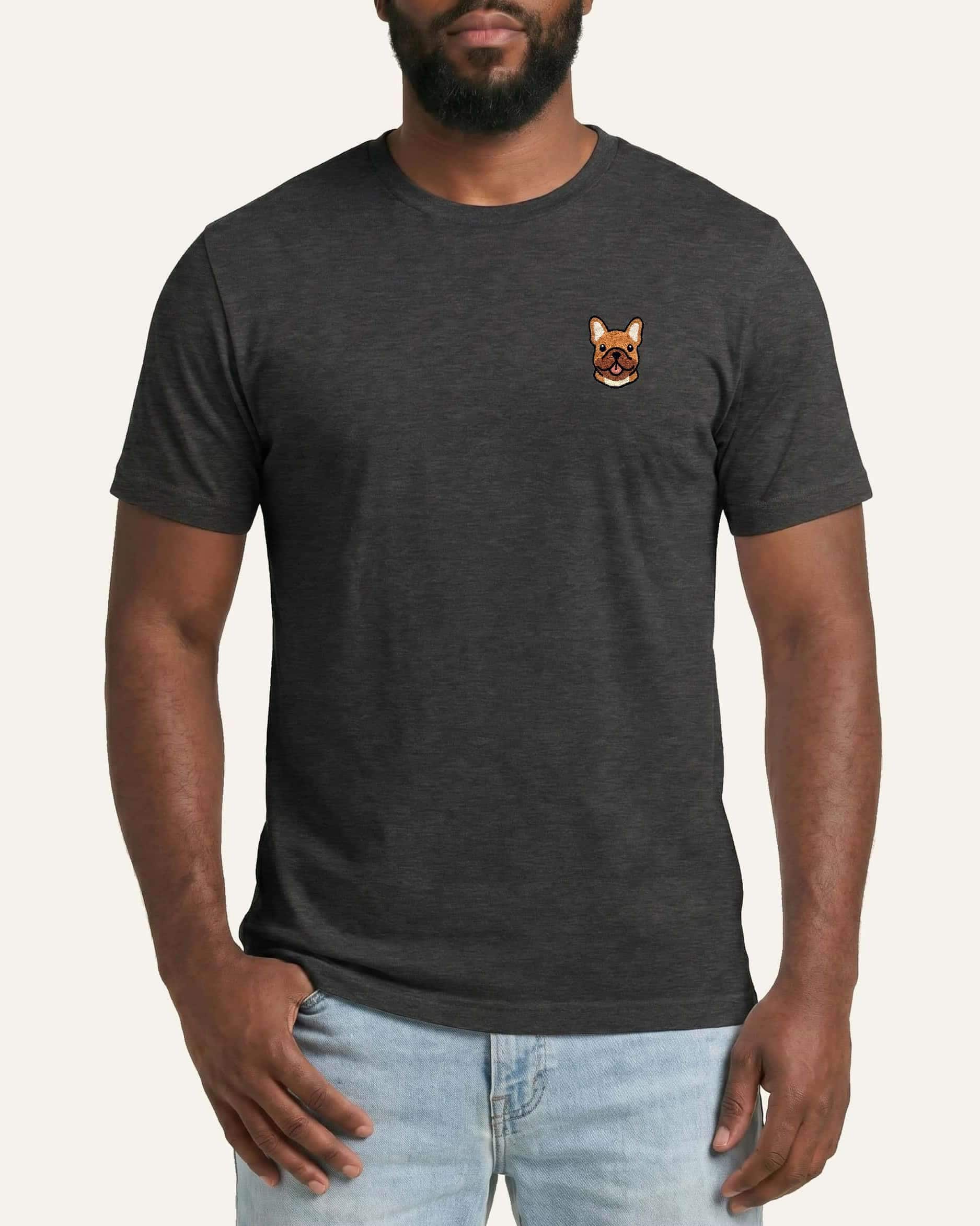 Man wearing Dark Grey Heather T-shirt with minimalist embroidered #fawn Frenchie icon on left chest.