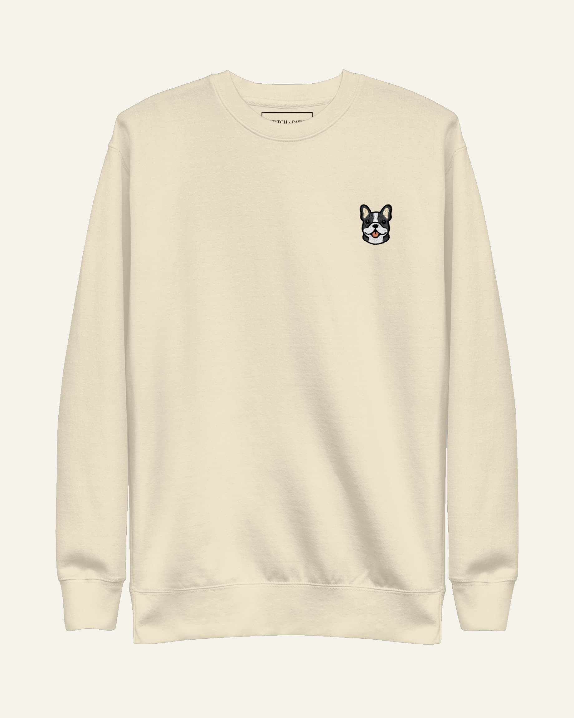Beige Sweatshirt with minimalist embroidered Frenchie icon on left chest.