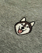Close-up detail of Husky embroidery on Light Grey fabric showing stitch texture.