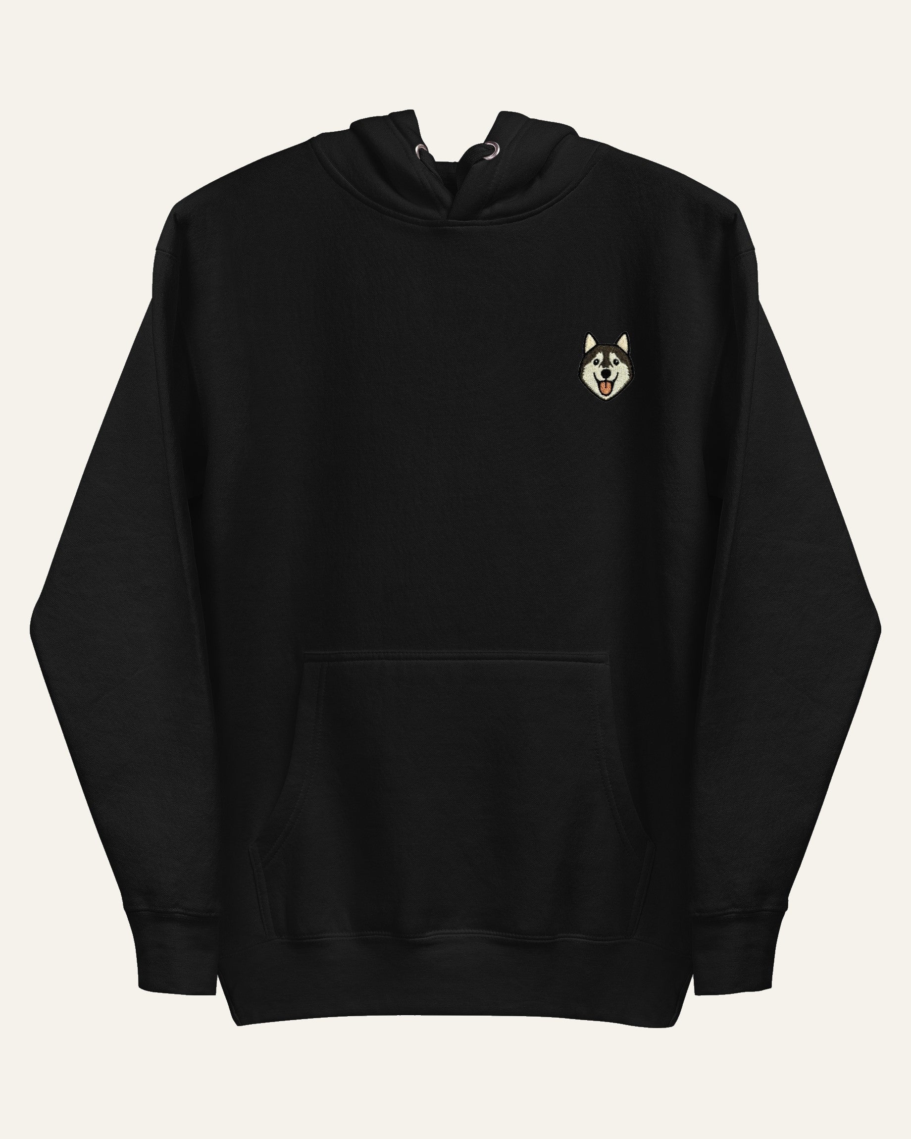 Black Hoodie with minimalist embroidered Husky icon on left chest. #black