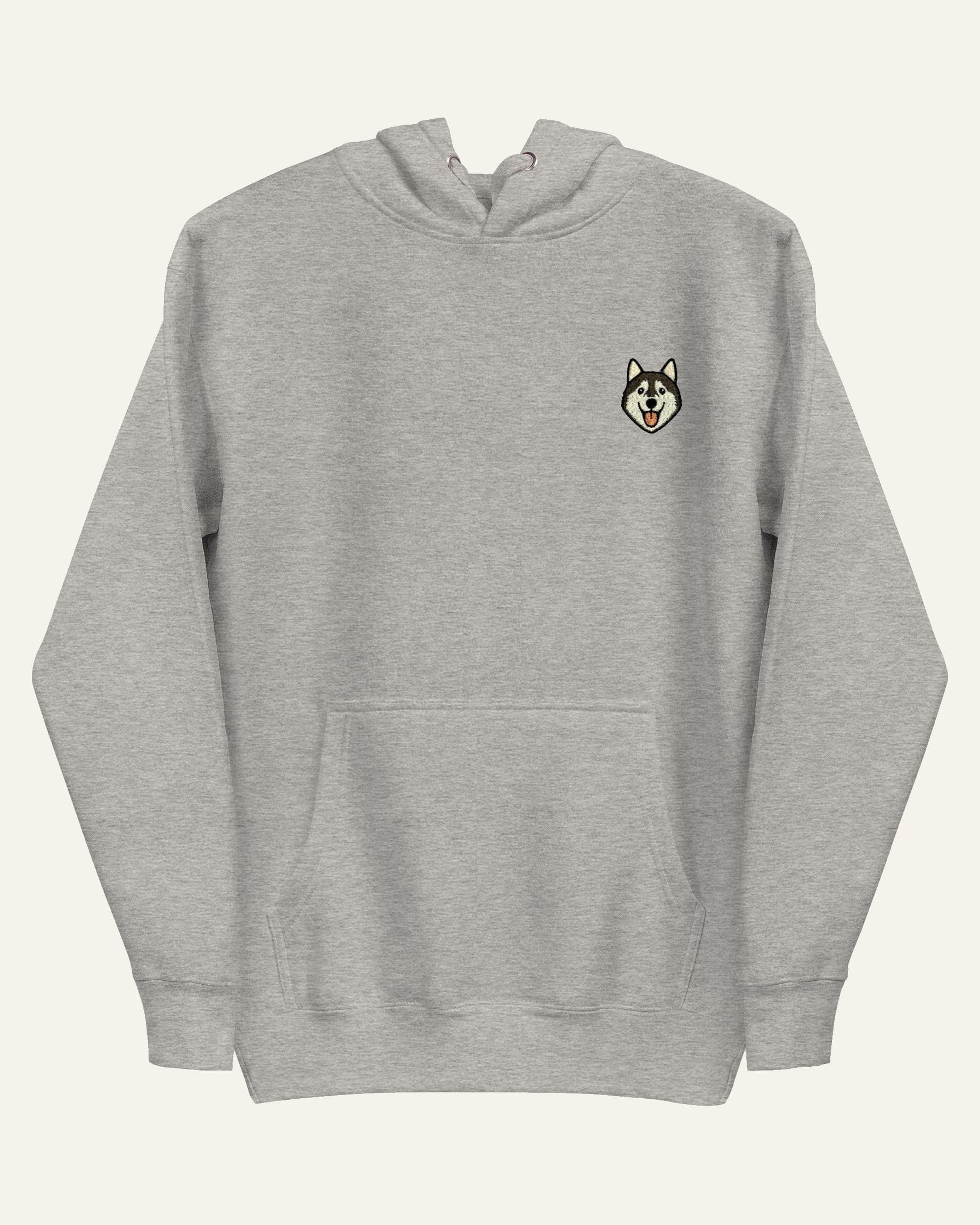 Light Grey Heather Hoodie with minimalist embroidered Husky icon on left chest.