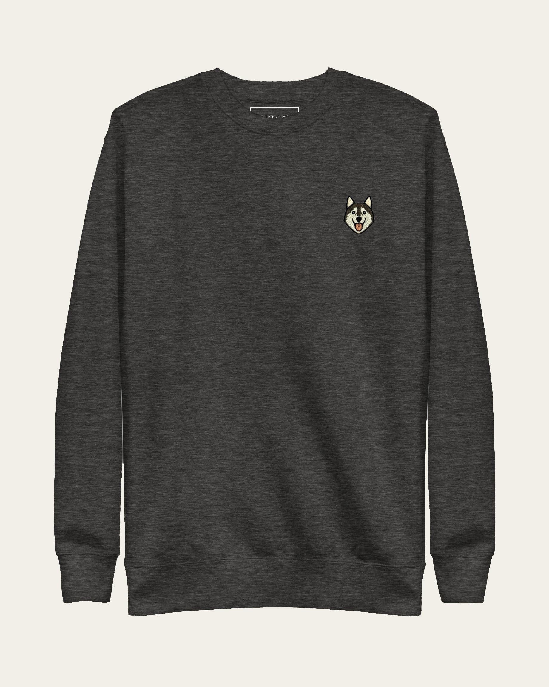 Dark Grey Heather Sweatshirt with minimalist embroidered Husky icon on left chest. #charcoal-heather