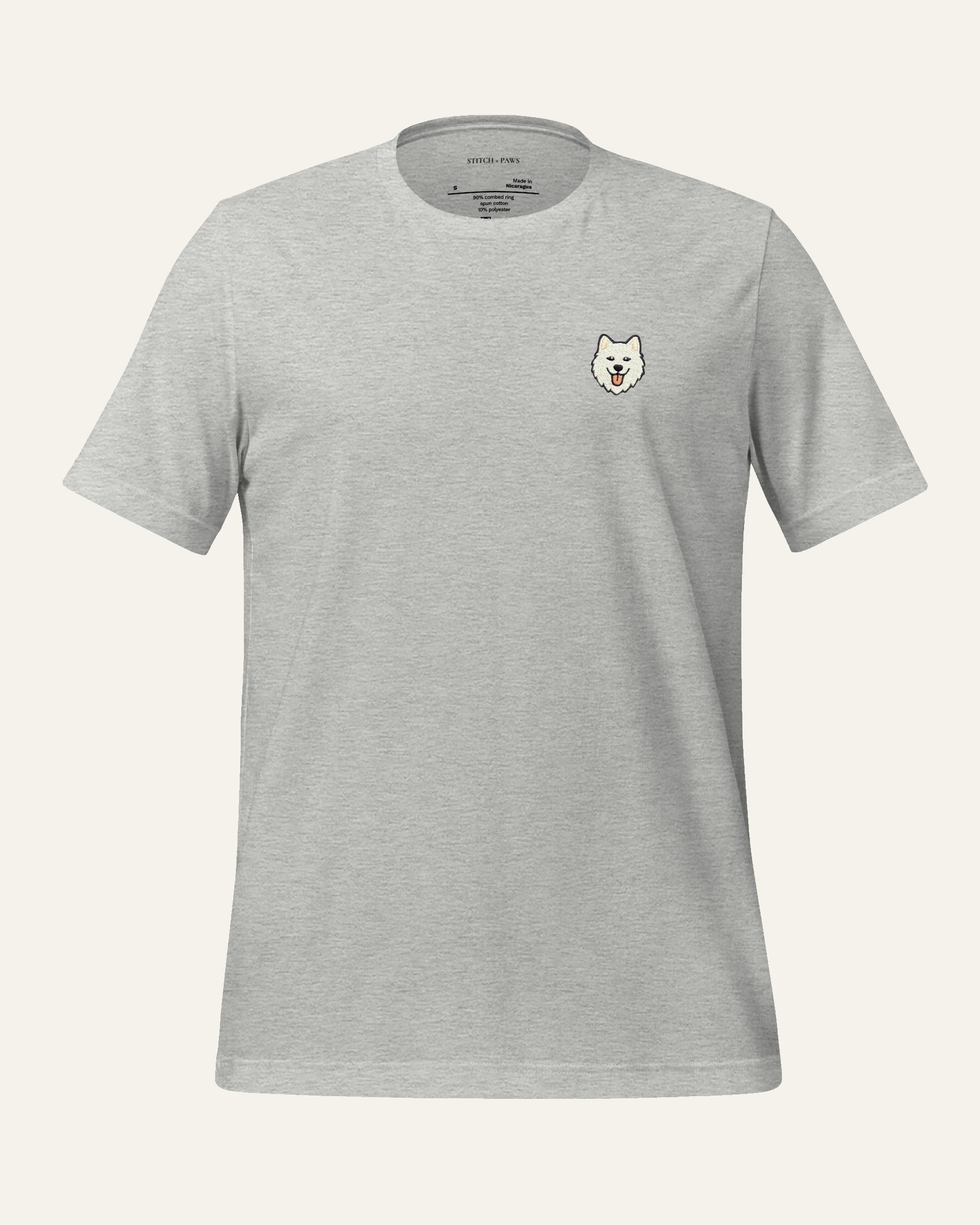 Light Grey Heather T-shirt with minimalist embroidered Samoyed icon on left chest.