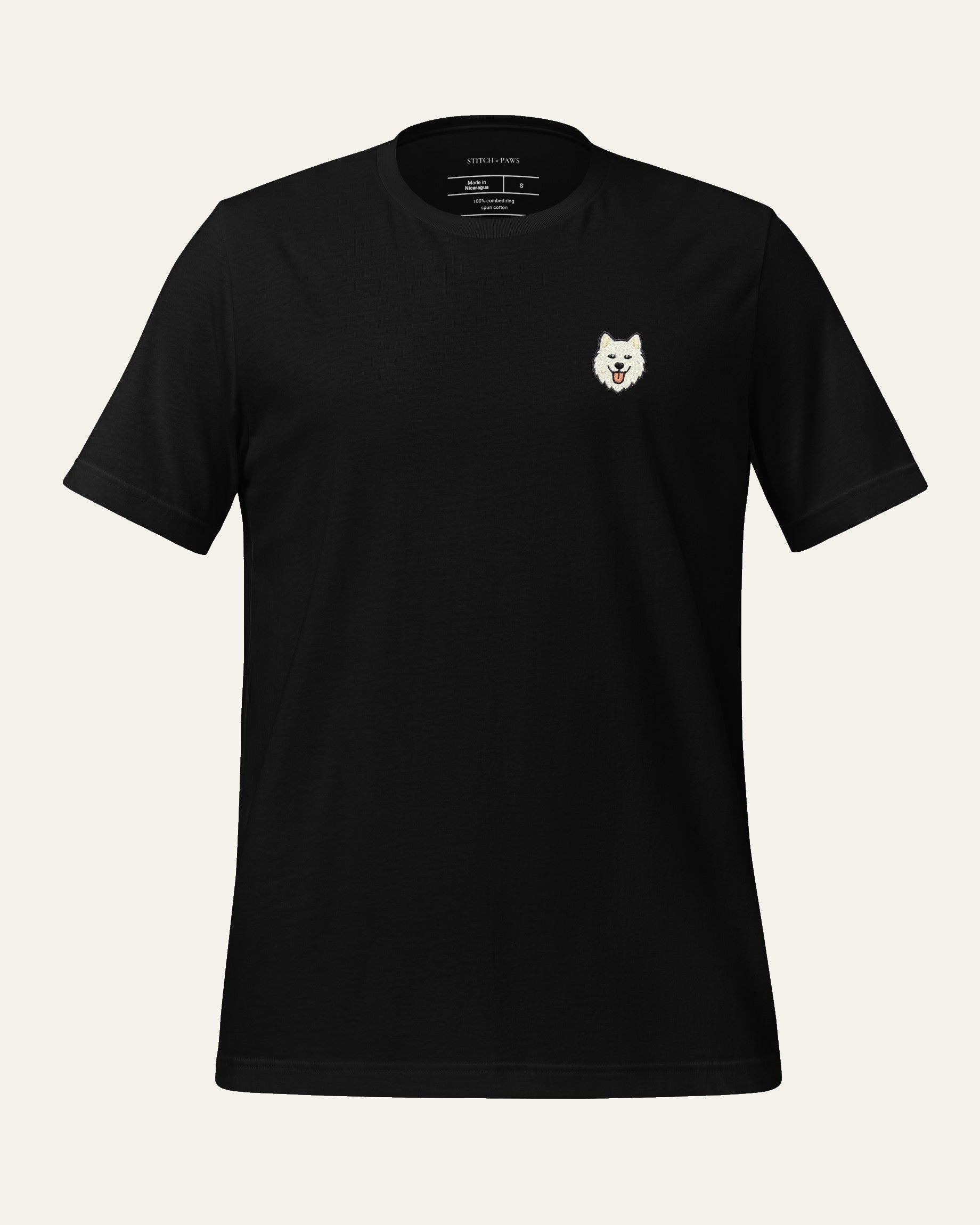 Black T-shirt with minimalist embroidered Samoyed icon on left chest.
