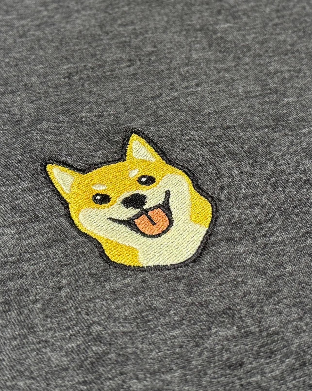 Close-up detail of Shiba Inu embroidery on Dark Grey Sweatshirt showing stitch texture.