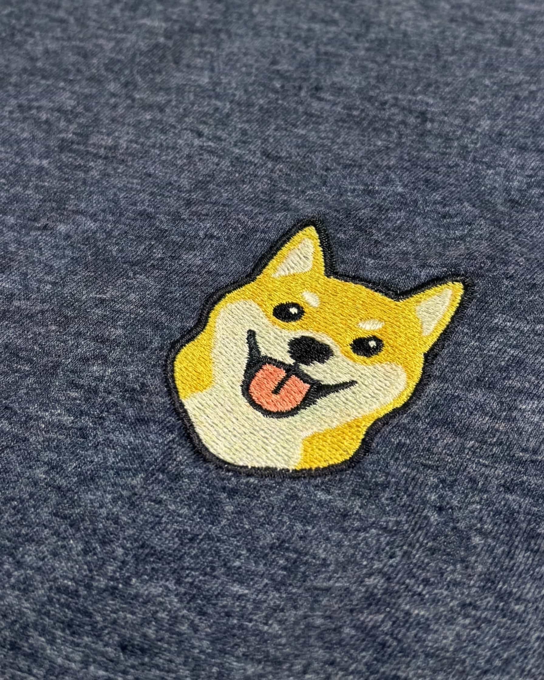 Close-up detail of Shiba Inu embroidery on Navy Heather fabric showing stitch texture.