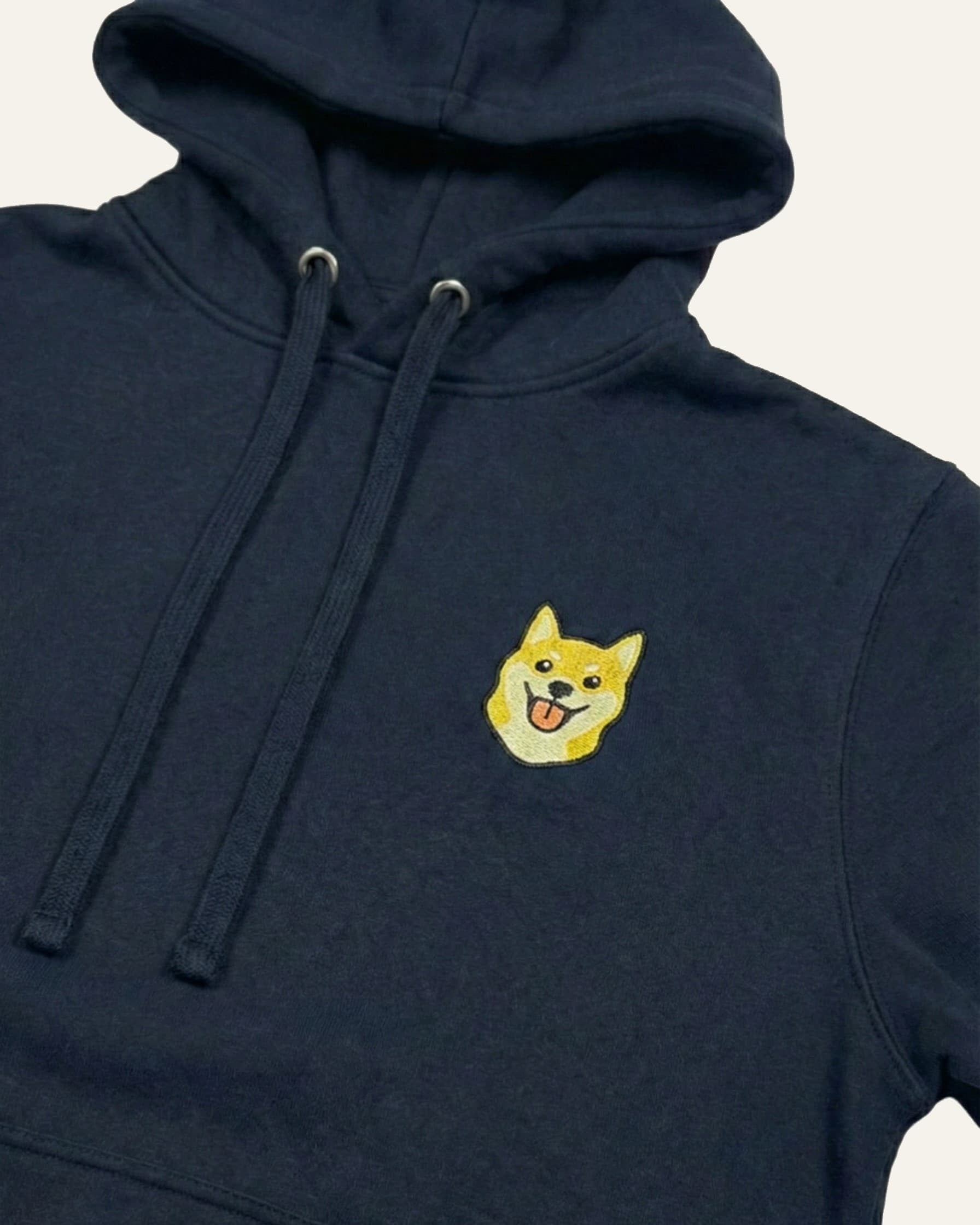 Navy Hoodie with minimalist embroidered Shiba Inu icon on left chest.