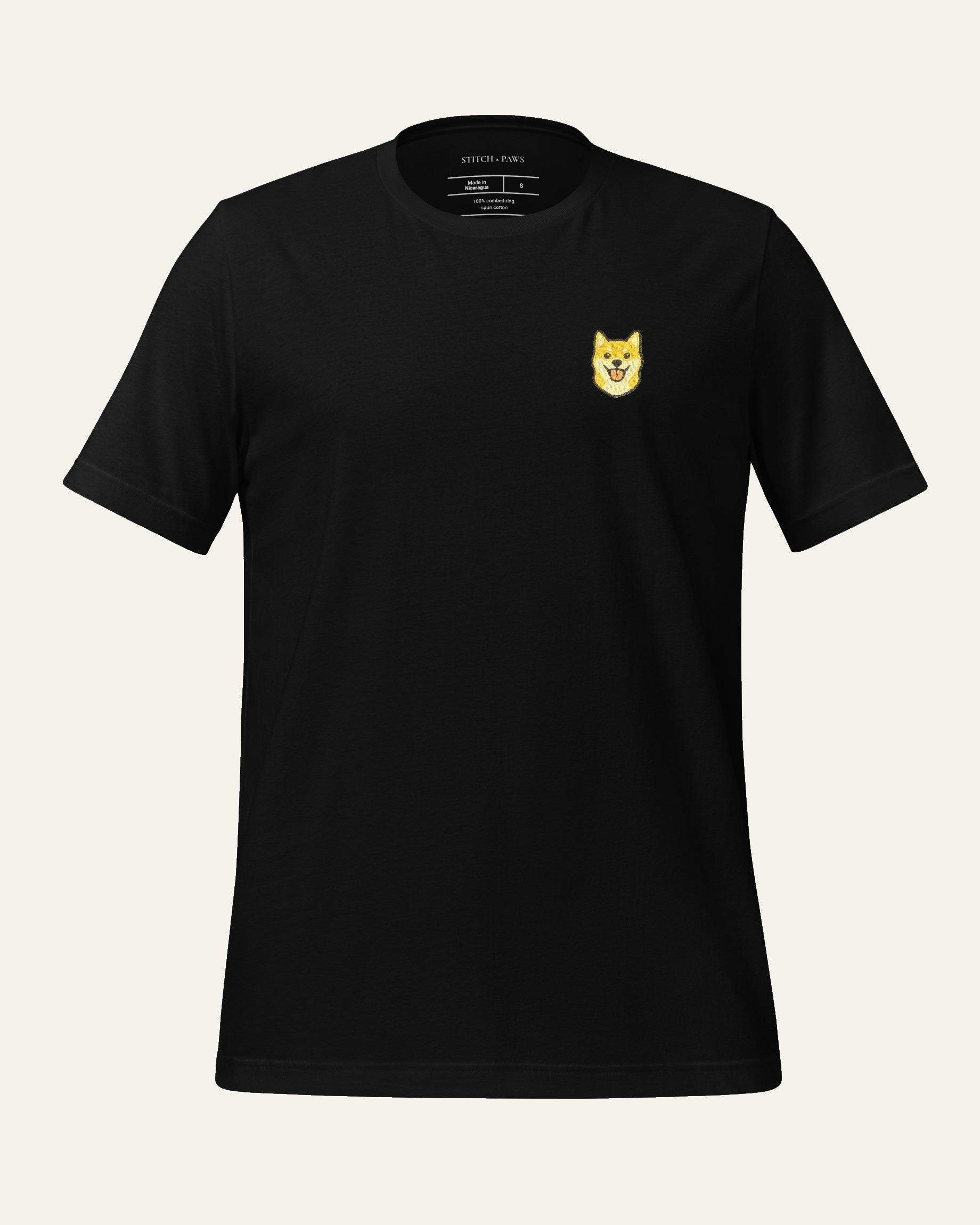 Black T-Shirt with minimalist embroidered Shiba Inu icon on left chest.