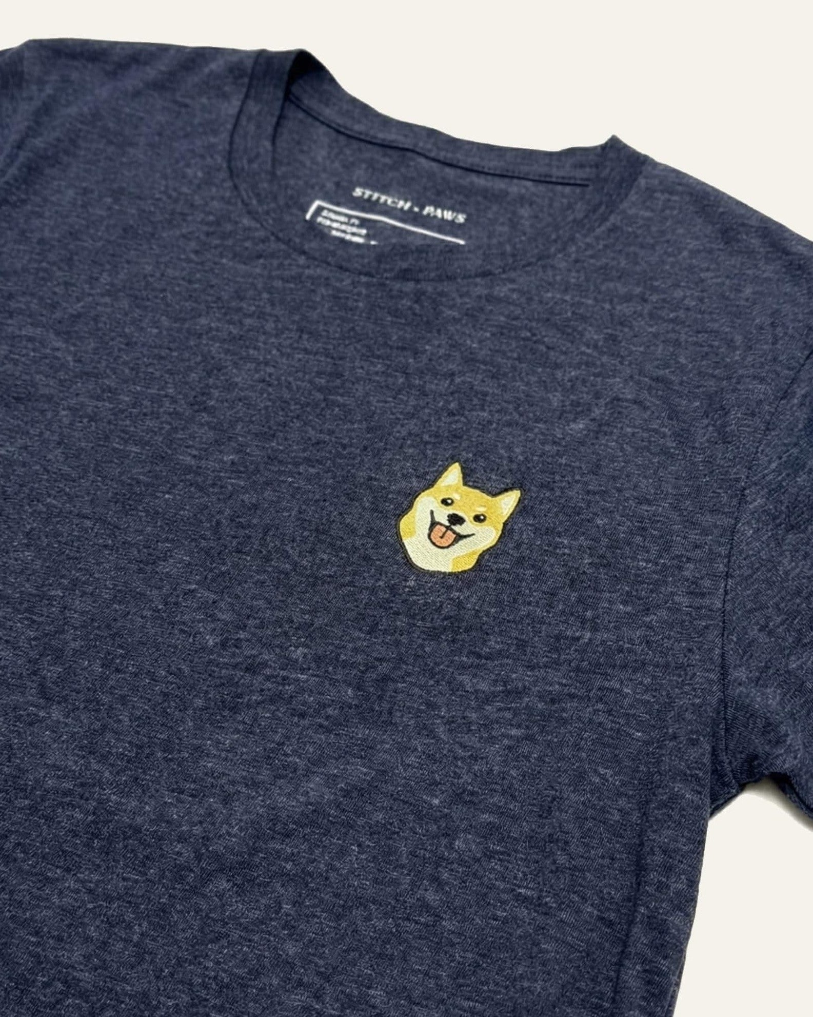 Midnight Navy Heather T-Shirt with minimalist embroidered Shiba Inu icon on left chest.